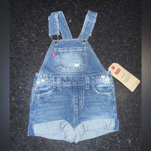 NEW LEVI’S DENIM BLUE JEAN OVERALLS SHORTS 100% COTTON SZ 6 MONTHS